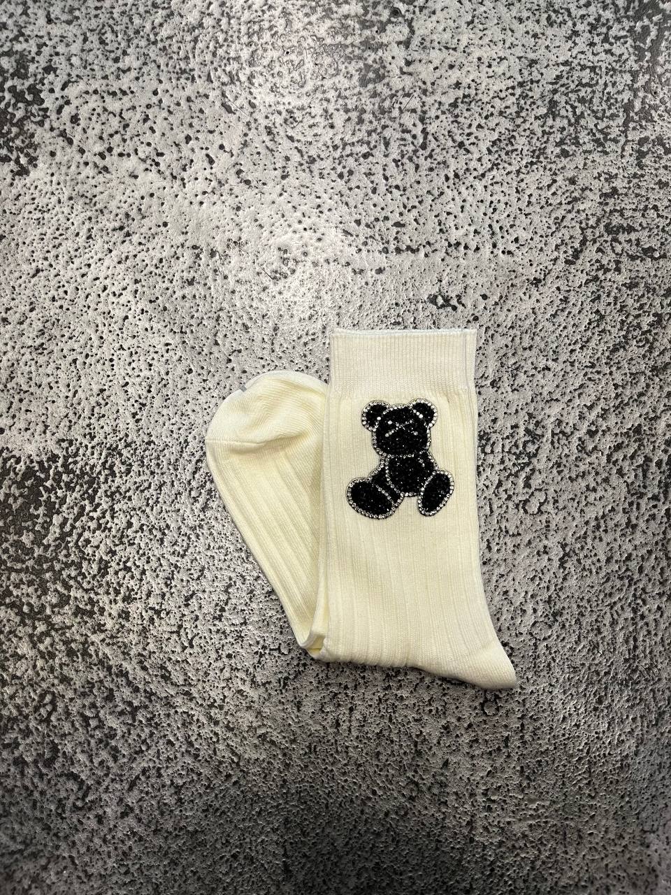 Calze in maglia a costine con ricamo e strass Avira