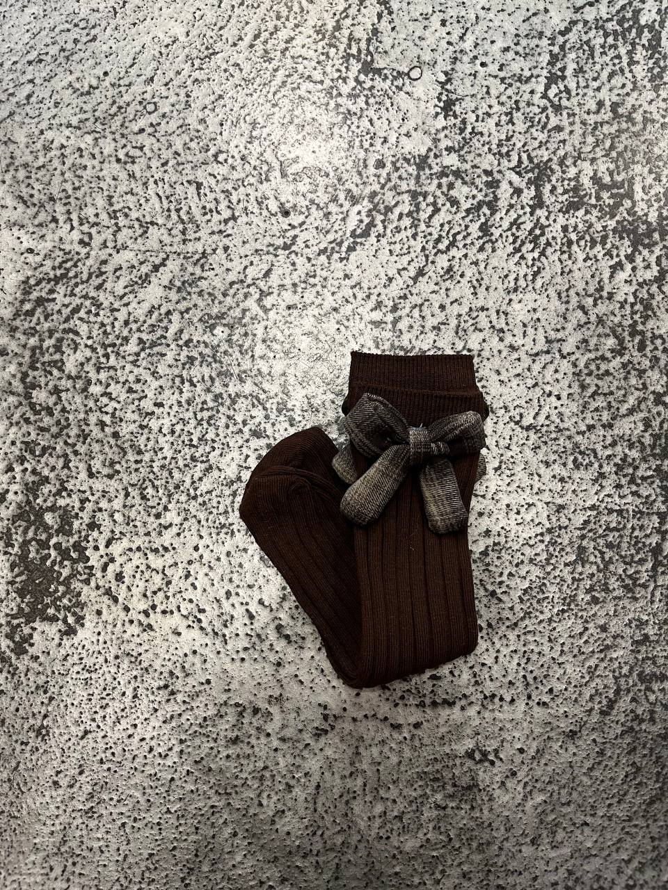 Calze lunghe a costine con fiocco a quadri Lumea