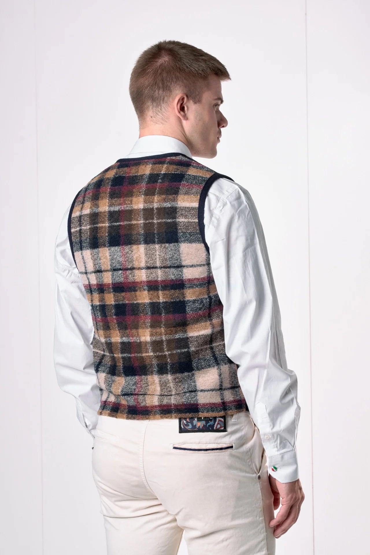 Gilet monopetto con retro e taschino in tessuto